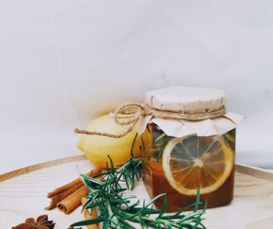 photo of jar near cinnamon sticks